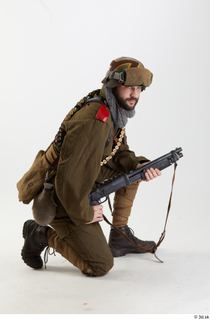 Photos Owen Reid WWI army holding gun kneeling whole body…